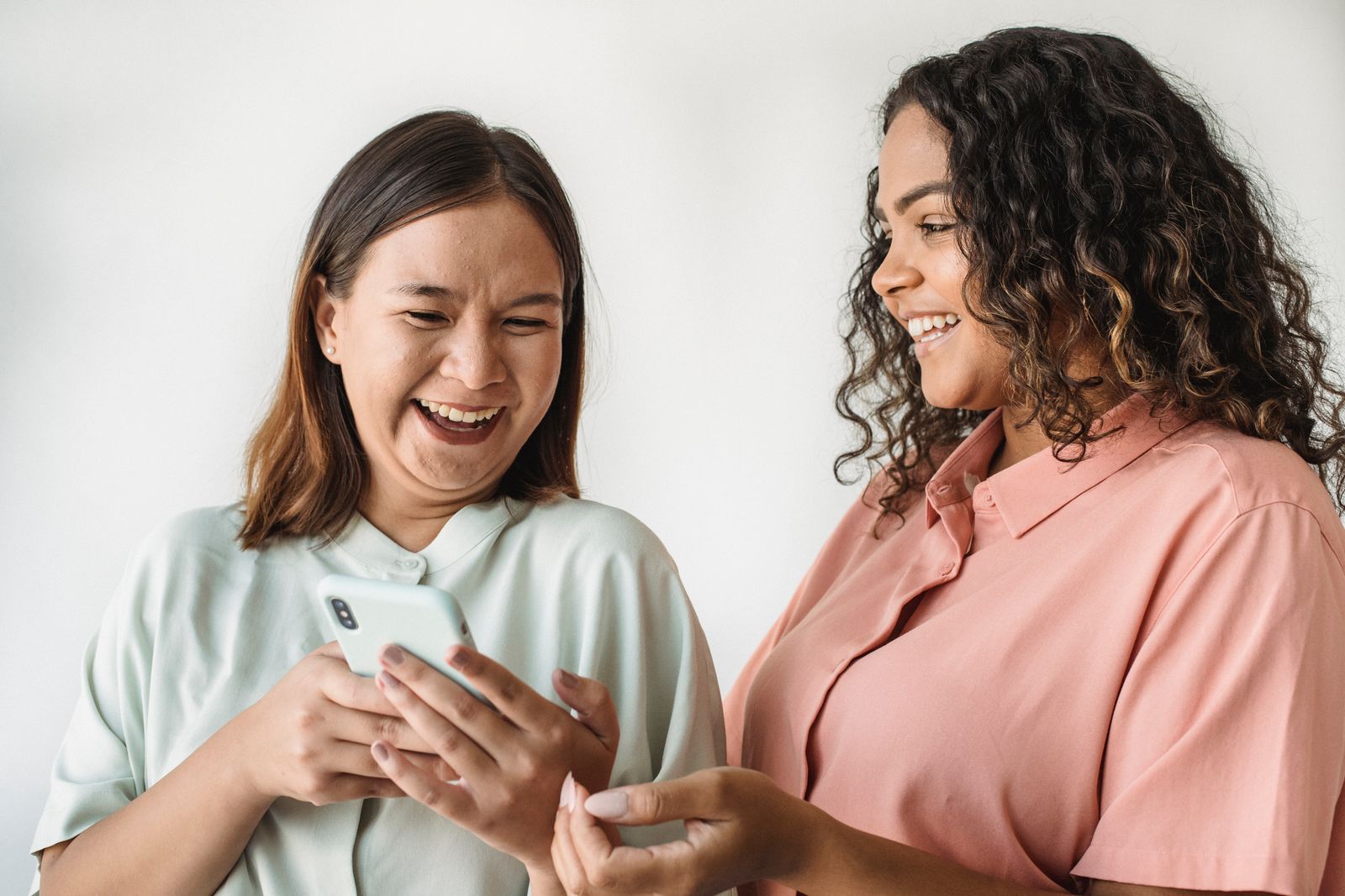 Au pairs chatting and laughing over the app